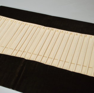 Rotolo Terra 24 bracciali c/divisori anellini e elastici